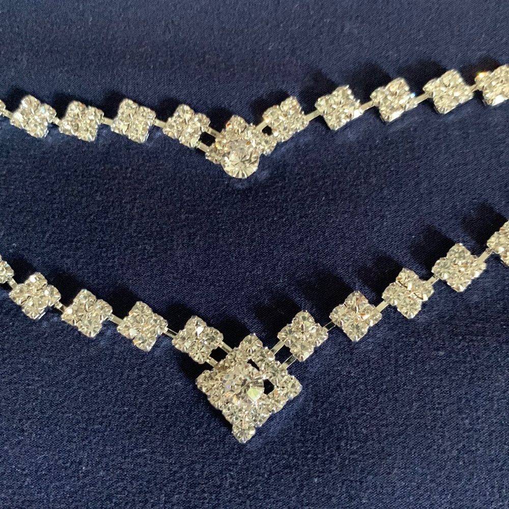 RHINESTONE SWEATER KEEPER